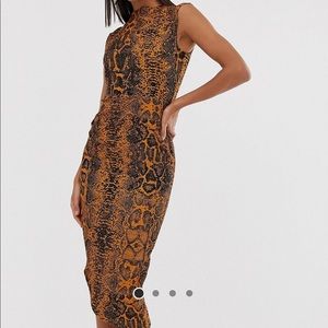 ASOS DESIGN midi pencil dress with tuck detail in
snake print